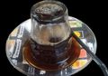 Berlibur ke Aceh? Yuk, Nikmati Cara Minum Kopi dengan Gelas Terbalik!