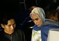 Dikawal Patwal Majelis, Kartika Putri Diam Menggendong Seorang Bocah