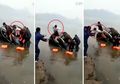 Panik Karena Mobilnya Tenggelam, Seorang Ayah Lemparkan Bayinya ke Pengunjung Pantai!