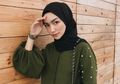 Inspirasi Gaya Fashion Hijab ala Melody Prima dengan Rok Kekinian