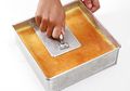 Tips Membuat Lapis Legit, Ini Alasan Kenapa Lapis Legit Perlu Ditekan Tiap Lapisannya