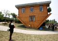 Bikin Pusing Kepala! Rumah Berfasad Terbalik ini Punya Furnitur yang Terbalik Pula Dalamnya.