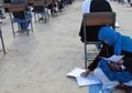 (Foto) Inspiratif, Wanita Ini Tetap Mengikuti Ujian Universitas Sambil Menyusui Anaknya