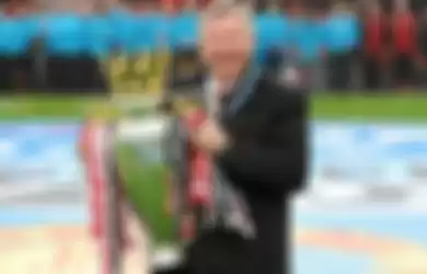 Manchester United manager Sir Alex Ferguson celebrates with the Barclays Premier League trophy, after the game