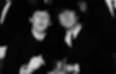 Paul McCartney dan John Lennon di tahun 1964