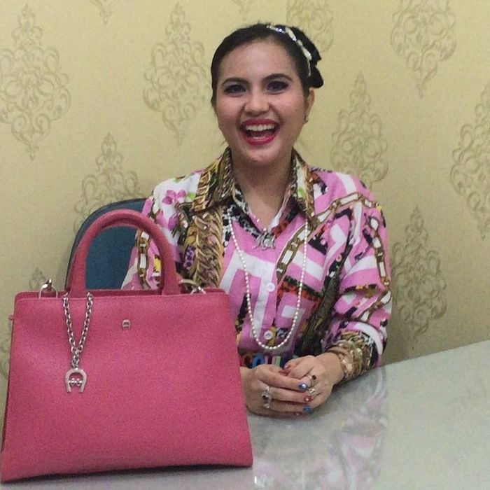 Melly Noviza