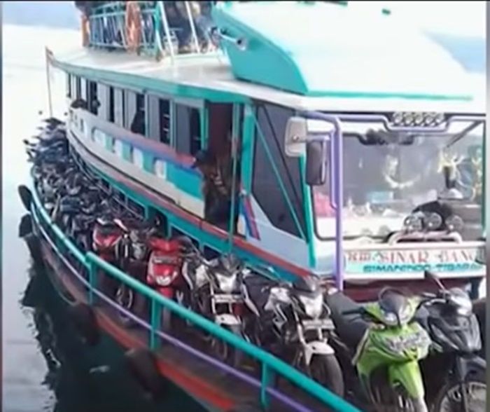 KM  SInar Bangun