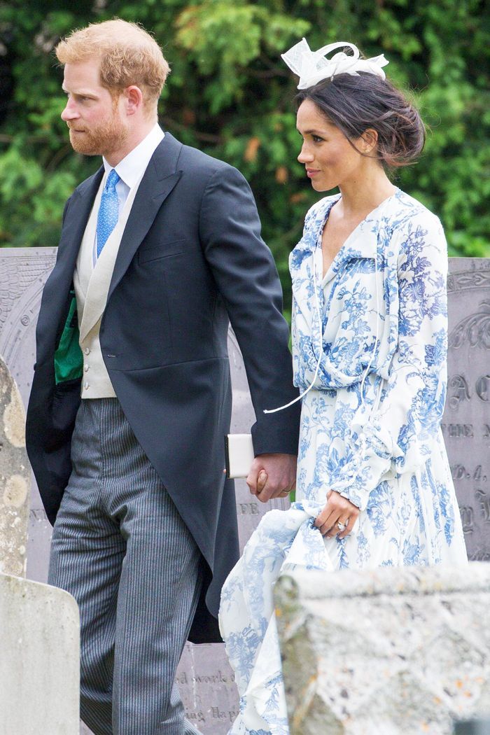 Meghan Markle dalam balutan dress dari Oscar de la Renta 
