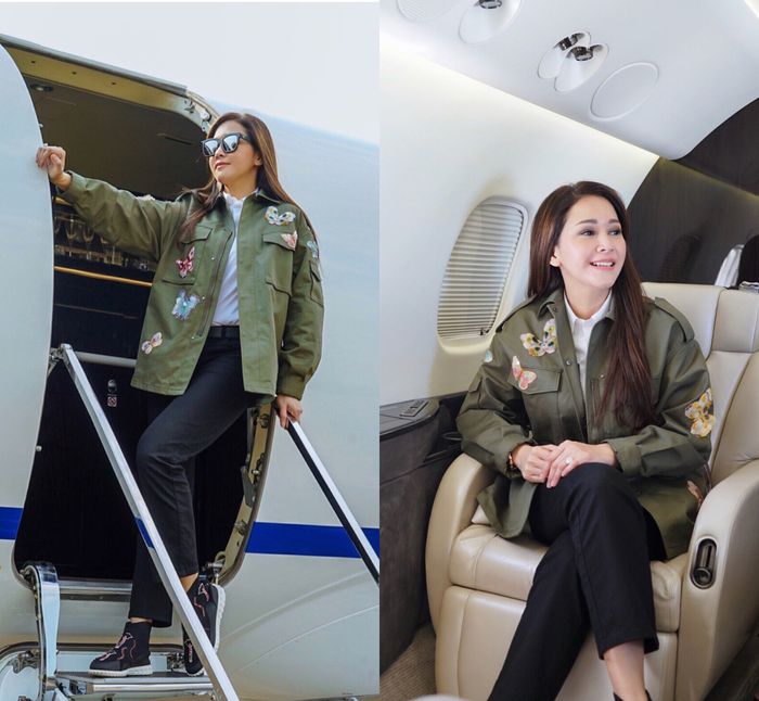Maia terlihat tampil modis dengan paduan busana bergaya kasual saat naik pesawat jet pribadinya