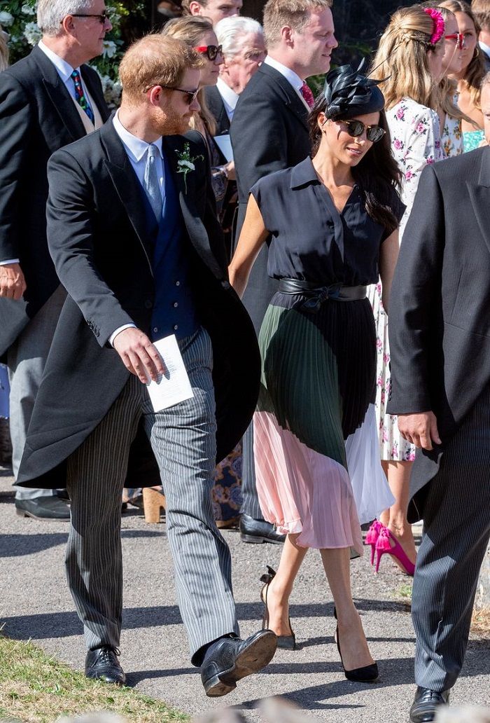 Pangeran Harry saat menghadiri pernikahan sahabatnya bersama Meghan Markle
