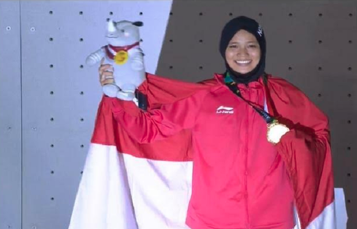 Medali emas diraih oleh cabor panjat tebing, Aries Susanti Rahayu dengan kecepatan 7.61 detik setela - Capture/Indosiar