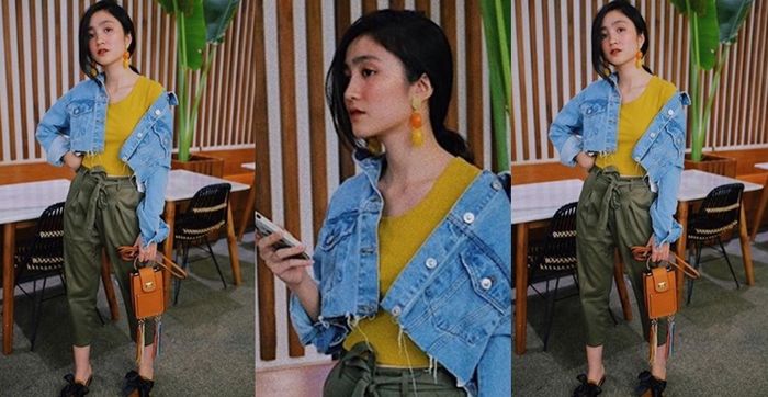 Febby Rastanty menggunakan atasan berwarna mustard