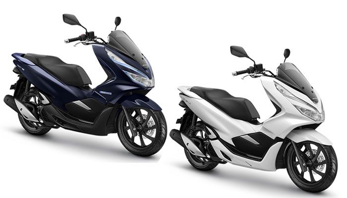 Honda PCX Hybrid (atas) dan PCX 150