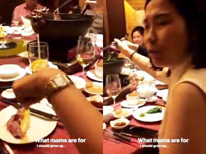 Veronica Tan nampak mengambilkan makanan untuk putranya