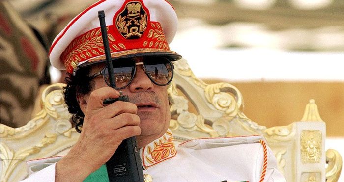 Muammar Gaddafi.