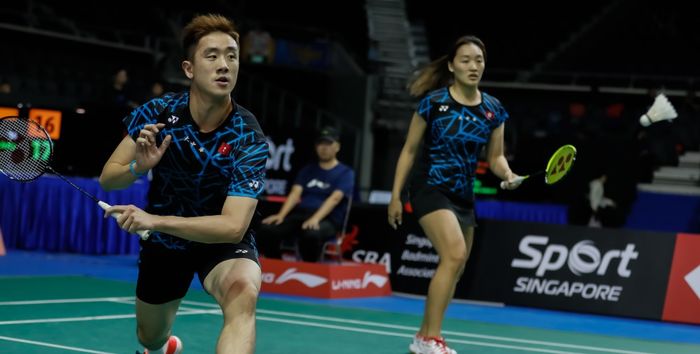 Pasangan ganda campuran Hong Kong, Tang Chun Man/Tse Ying Suet, saat berlaga pada babak kedua Singapore Open 2019 di Singapore Indoor Stadium, Kallang, Kamis (11/4/2019).