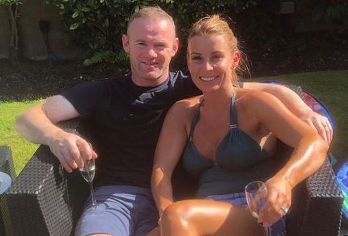 Coolen Rooney bersama sang suami, Wayne Rooney.