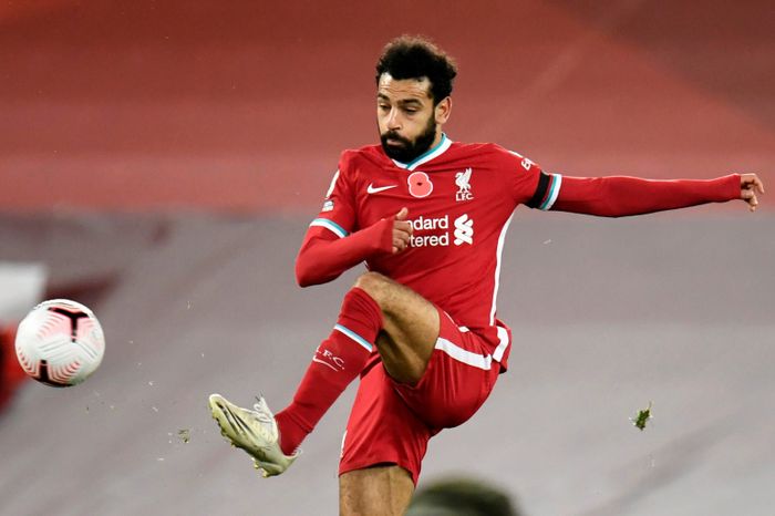 FILE PHOTO: Soccer Football - Premier League - Liverpool v West Ham United - Anfield, Liverpool, Britain - October 31, 2020 Liverpool's Mohamed Salah in action Pool via REUTERS/Peter Powell EDITORIAL USE ONLY. No use with unauthorized audio, video, data, fixture lists, club/league logos or 'live' se