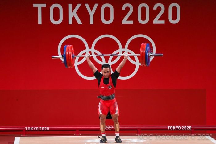 Lifter Indonesia Eko Yuli Irawan saat berjuang di kelas 61 kg angkat besi putra Olimpiade Tokyo 2020, Minggu (25/7/2021) siang WIB.