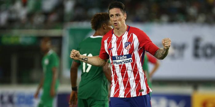 Ekspresi striker Atletico Madrid, Fernando Torres seusai mencetak gol ke gawang timnas Nigeria B pad