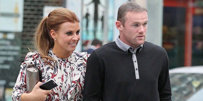 Kemesraan antara Wayne Rooney (kanan) dan istrinya, Coleen Rooney, pada tahun 2004.