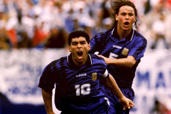 Argentina's Diego Maradona (left) celebrates scoring their third goal with teammate Fernando Redondo