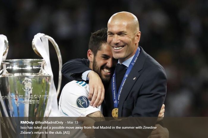 Isco dan Zinedine Zidane saling berpelukan merayakan kesuksesan Real Madrid memenangi Liga Champions ketiga kalinya berturut-turut 