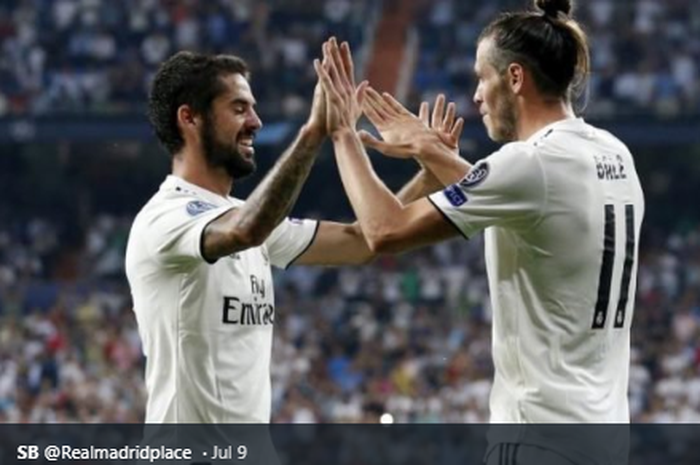 Dua pemain Real Madrid, Isco dan Gareth Bale (kanan), melakukan selebrasi.