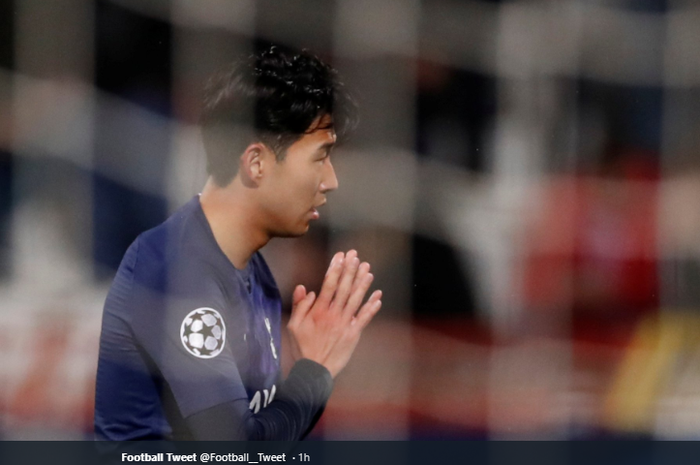 Son Heung-Min memohon maaf kepada Andre Gomes di tengah perayaan golnya di ajang Liga Champions, Kamis (7/11/2019)