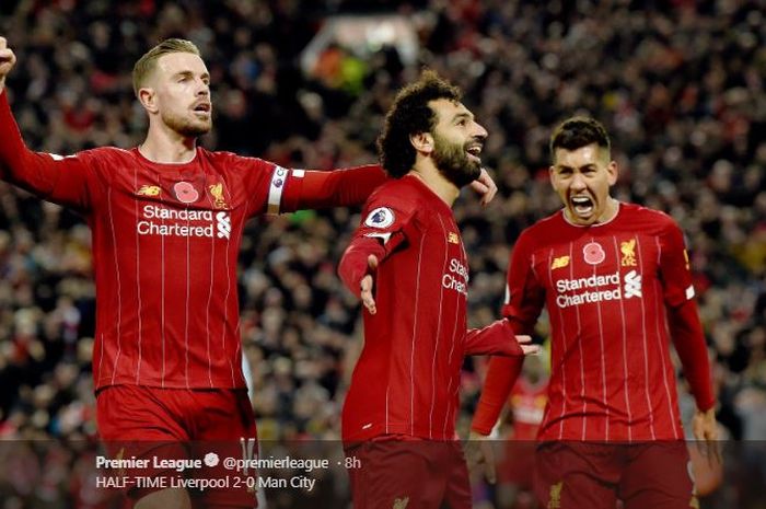 Trio Liverpool, Jordan Henderson, Mohamed Salah, dan Roberto Firmino (ki-ka), merayakan gol ke gawang Manchester City dalam laga pekan ke-12 Liga Inggris di Stadion Anfield, 10 November 2019.