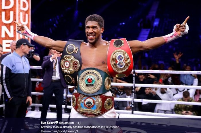 Petinju, Anthony Joshua berhasil merebut kembali gelar IBO, IBF, WBA, WBO dalam pertarungan ulang melawan Andy Ruiz Jr di Diriyah Arena, Arab Saudi, Minggu (8/12/2019)