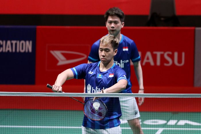 Pasangan ganda putra Indonesia, Marcus Fernaldi Gideon/Kevin Sanjaya Sukamuljo, saat menjalani laga melawan wakil Taiwan, Lin Chia Yu/Yang Ming-Tse, pada babak kesatu Malaysia Masters 2020.