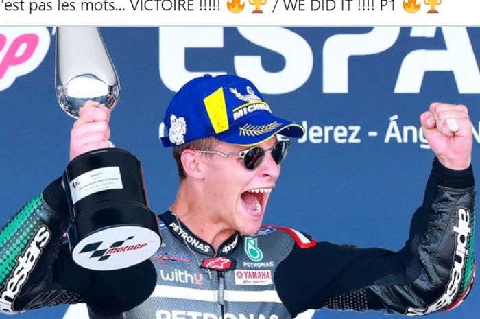 Pembalap Petronas Yamaha SRT, Fabio Quartararo, merayakan keberhasilannya memenangi balapan MotoGP Spanyol di Sirkuit Jerez, Spanyol, 19 Juli 2020.