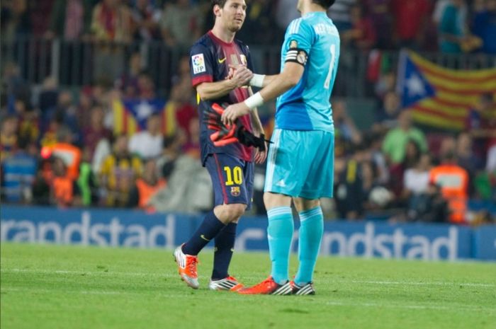 Lionel Messi dan Iker Casillas saat bersaing di Liga Spanyol.