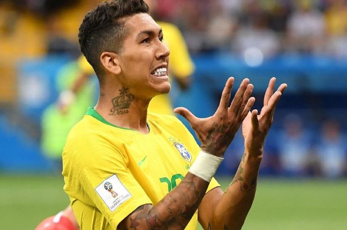 Roberto Firmino saat berlaga bersama dengan timnas Brasil.