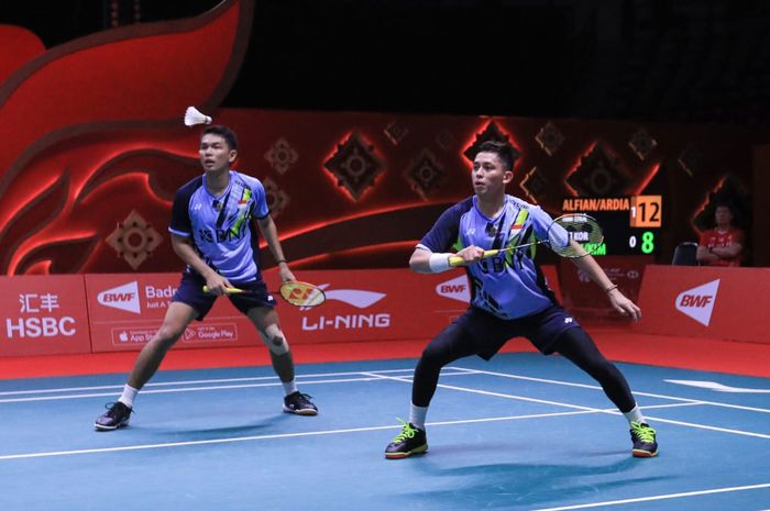 Pasangan ganda putra Indonesia, Fajar Alfian/Muhammad Rian  Ardianto, pada laga pertama BWF World Tour Finals 2022 di Nimibutr Arena, Bangkok, Thailand, Rabu (7/12/2022).