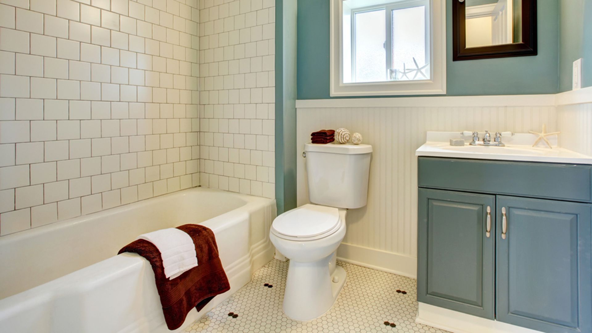 Classic simple blue bathroom with white tile.; Shutterstock ID 95931778; PO: MC for TODAY