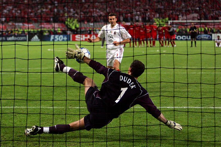 Liverpool's Jerzy Dudek saves the final penalty from AC Milan's Andrei Shevchenko