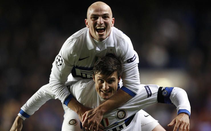 Inter Milan's Javier Zanetti and Esteban Cambiasso (top) celebrate after the game