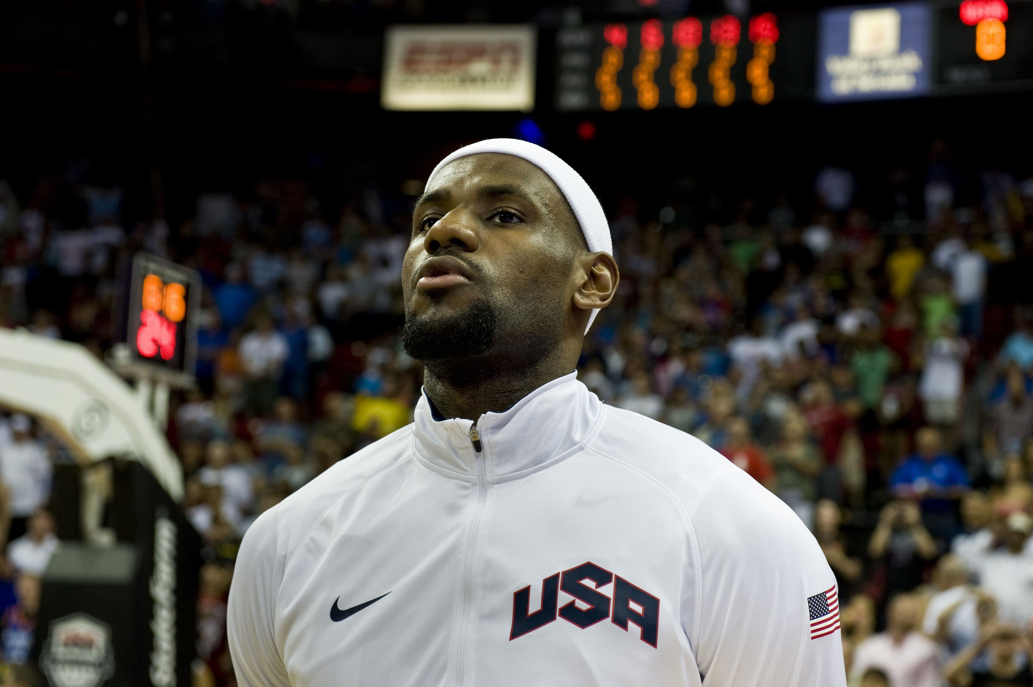 Lebron James, USA Olympic Men's Basketball player, listens to the National Anthem prior to the start of the USA versus  Dominican Republic exhibition game July 12, 2012, at the Thomas & Mack Center, Las Vegas, Nev. James is the only member of the 2012 Champion Miami Heat team on the Olympic Basketball team this year. (U.S. Air Force photo by Airman 1st Class Daniel Hughes)