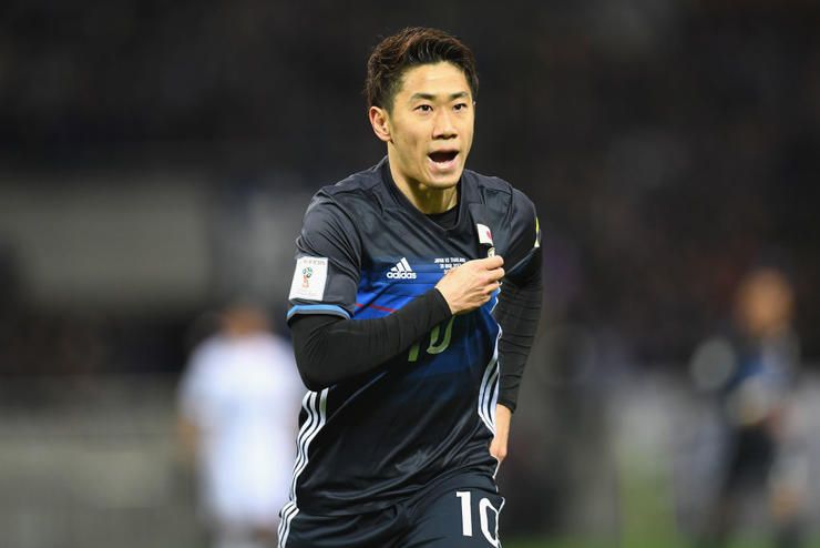 SAITAMA, JAPAN - MARCH 28:  Shinji Kagawa of Japan celebrates scoring the opening goal during the 20