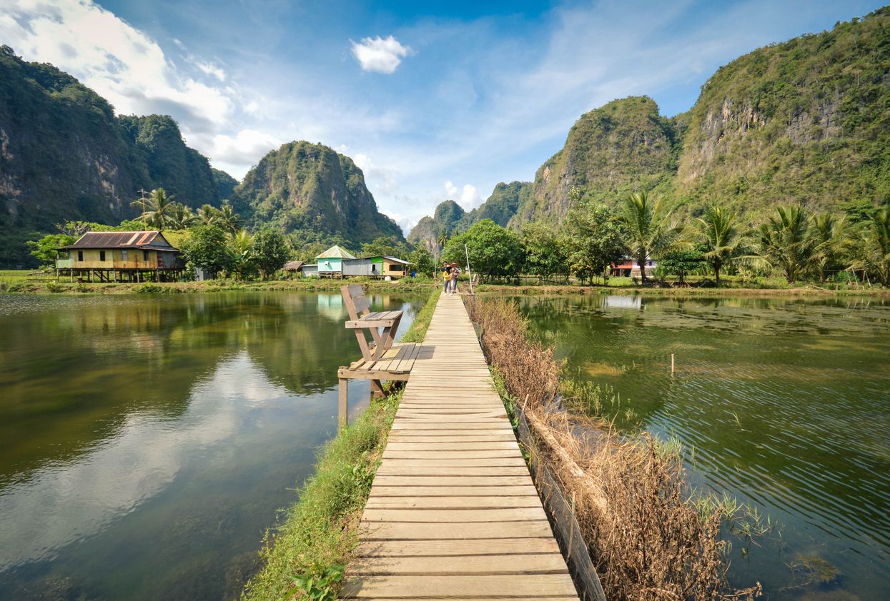 Beautiful limestones and water reflections in Rammang Rammang park near Makassar, South Sulawesi, In