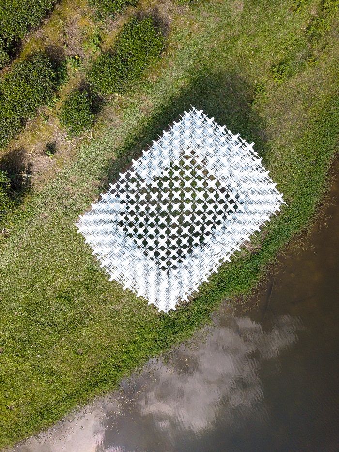 Paviliun Modular di Kebun Teh  Vietnam Terbuat dari 2.000 Komponen Kayu Silang