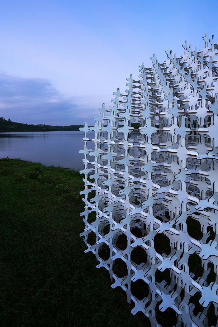 Paviliun Modular di Kebun Teh  Vietnam Terbuat dari 2.000 Komponen Kayu Silang