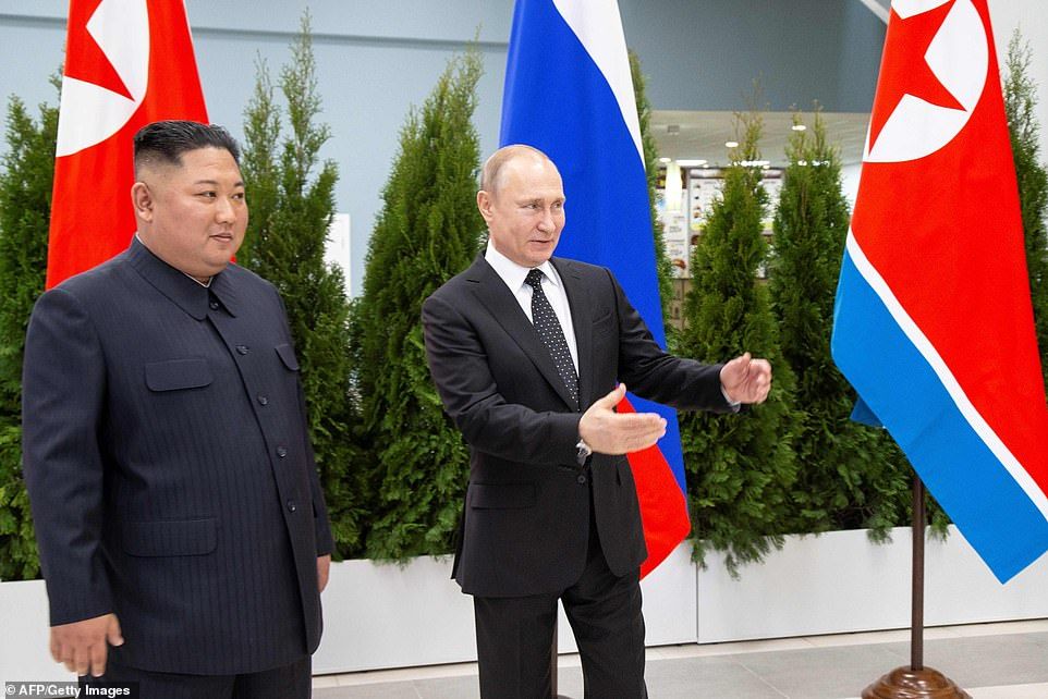 Vladimir Putin dan Kim Jong Un.