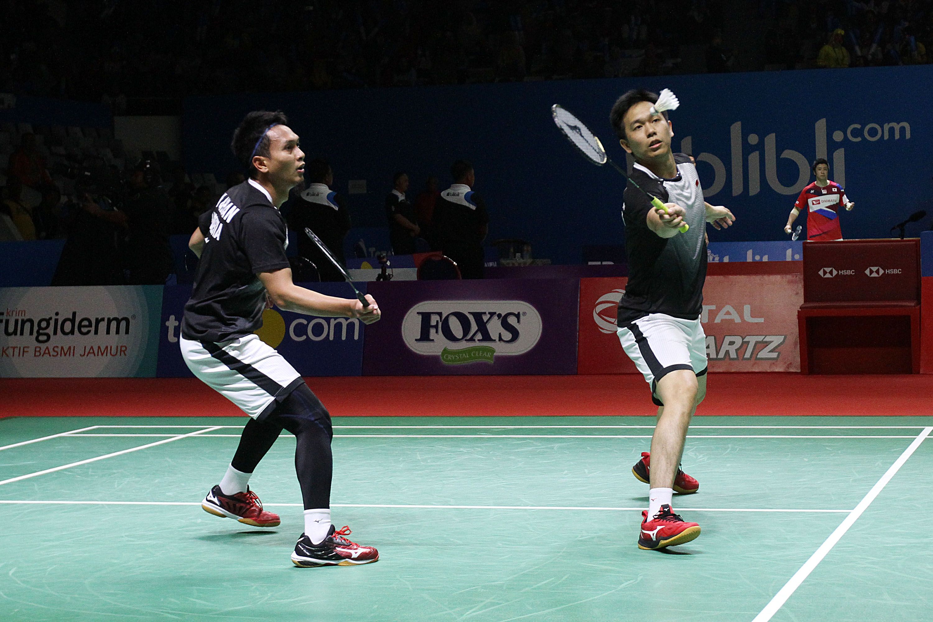 Pebulutangkis ganda putra Indonesia Mohammad Ahsan, Hendra Setiawan saat melawan pebulutangkis ganda putra asal Germany Mark Lamsfuss Marvin Seidel dalam turnamen bulutangkis Blibli Indonesia Open 2019 part of HSBC BWF World Tour Super 1000 di Senayan, Jakarta, Kamis (18/7/2019) Mohammad Ahsan, Hend