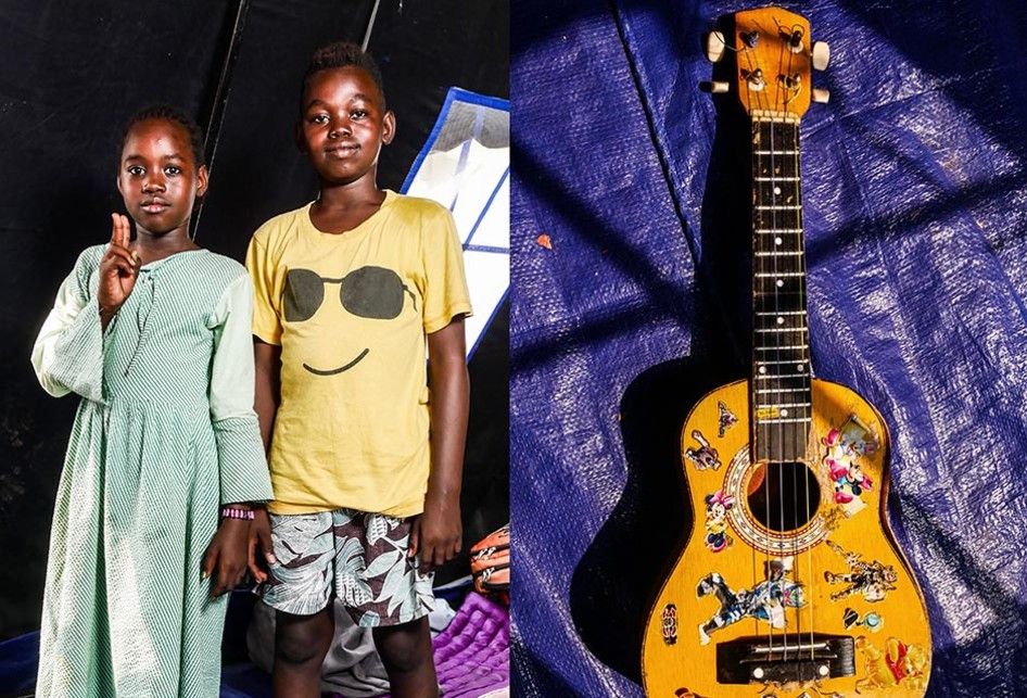 Foto dirilis Senin (13/8/2019), menunjukkan anak-anak pencari suaka asal Sudan dengan ukulele di tempat penampungan sementara di Kalideres, Jakarta. Sebanyak 1.081 warga negara asing pencari suaka dari 7 negara yang mengalami konflik telah tinggal di Indonesia bertahun-tahun lamanya, memendam rasa i