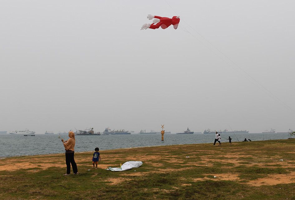 Kondisi wilayah di Singapura yang diselimuti kabut asap, Minggu (15/9/2019). Kabut asap dari kebakaran hutan dan lahan di Indonesia berimbas hingga ke Singapura dan membuat kualitas udara negara tersebut mencapai tingkat yang tidak sehat untuk pertama kalinya dalam tiga tahun terakhir.