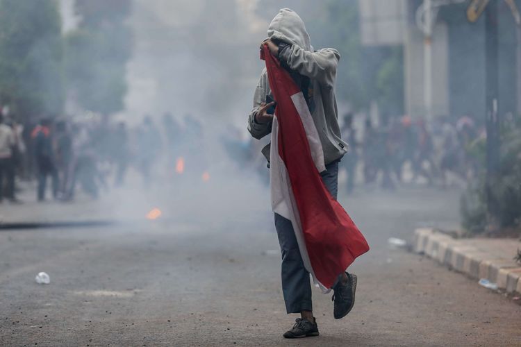 Pelajar melakukan Aksi Tolak RUKHP di Belakang Gedung DPR/MPR, Palmerah, Jakarta Barat, Rabu (25/9/2019).