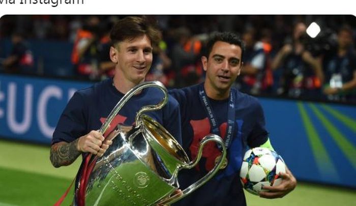 Lionel Messi dan Xavi Hernandez merayakan keberhasilan Barcelona menjuarai Liga Champions.